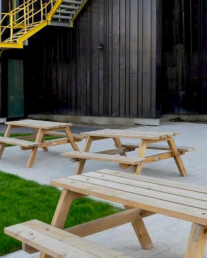 Picnic benches in the outdoor breakout area